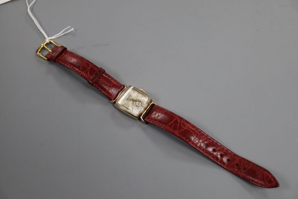 A ladys 1950s? 10k gold filled Longines manual wind wrist watch, on later associated strap.